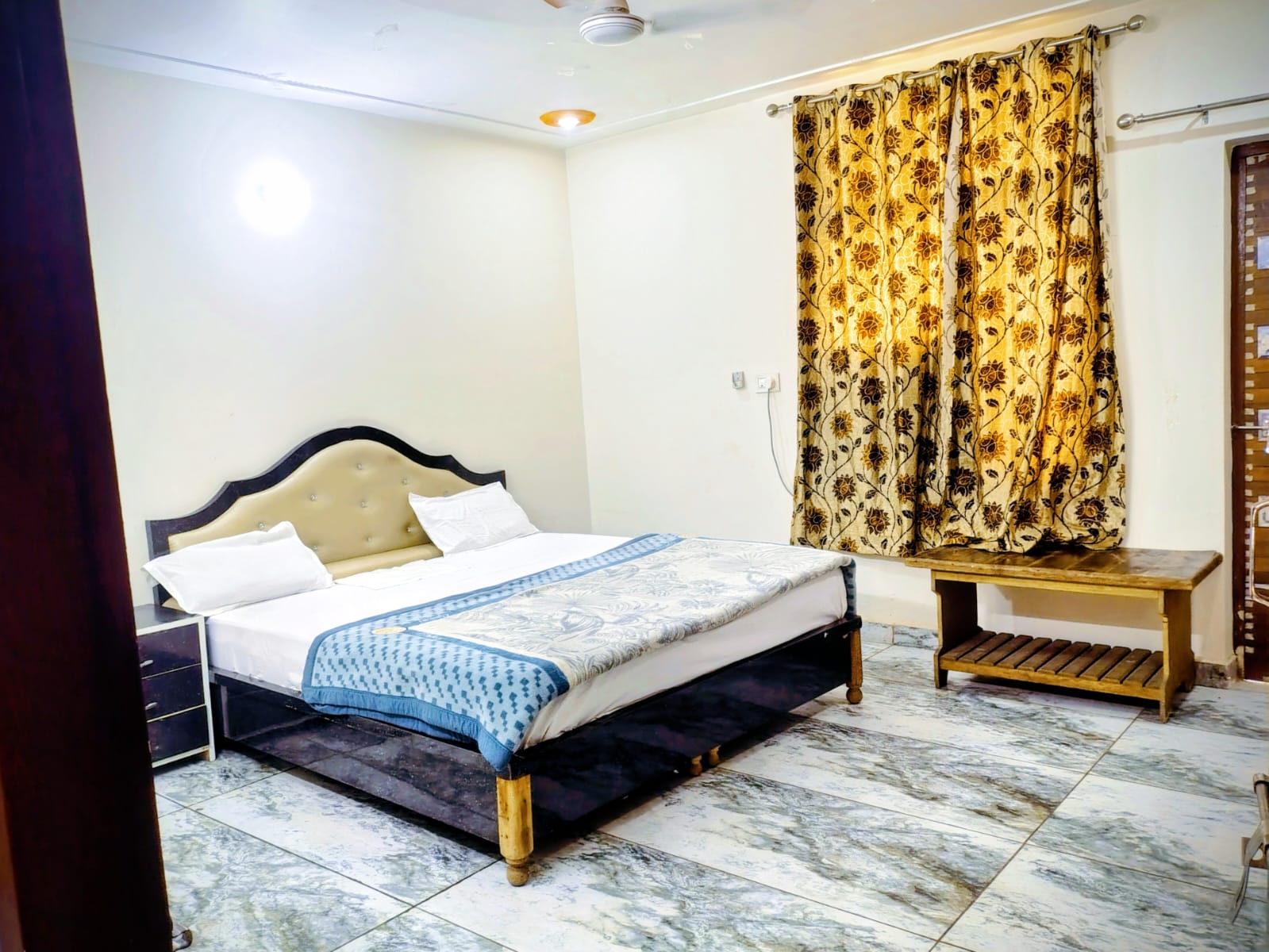 radhika comfort stay - Tap to explore photos