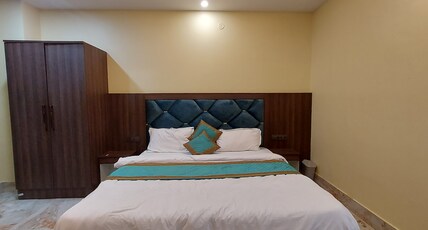 Strawbell Residency Room Type - Deluxe Room