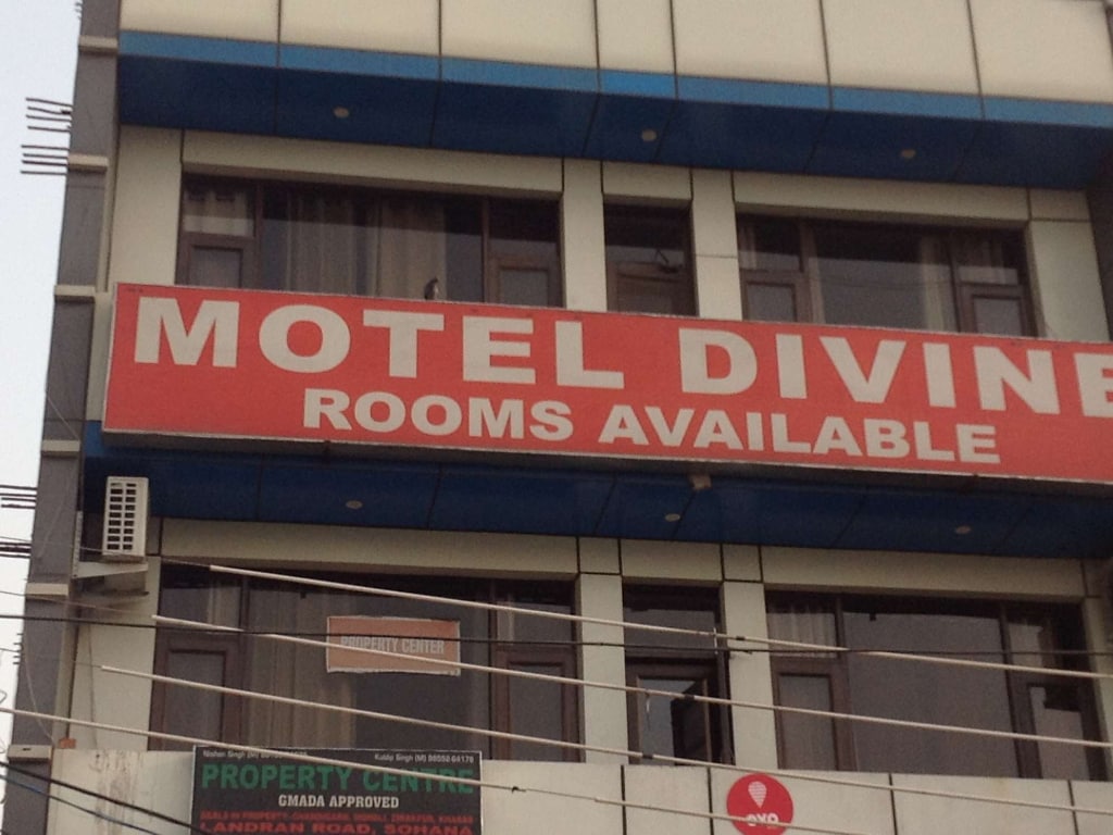 Divine Motel - Tap to explore photos
