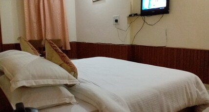 Deepjyoti Homestay Room Type - Hill-view Deluxe Room