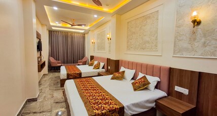 Darshan Residency | Walkable to Kashi Vishwanath Temple Room Type - Family four bed room