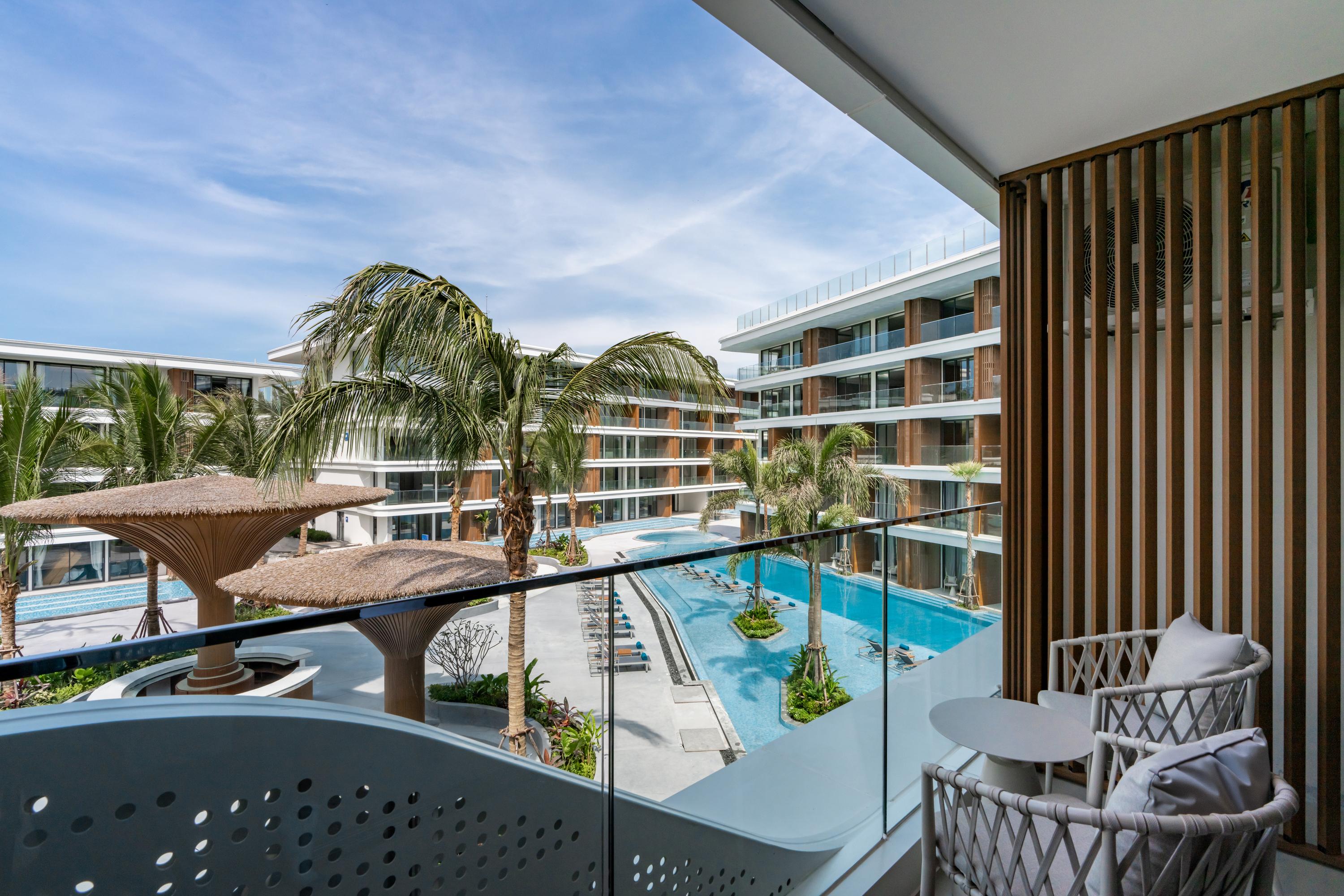 Kora Beach Resort Phuket - Tap to explore photos