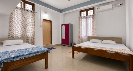 PNG HOMESTAY Room Type - Deluxe room AC 2