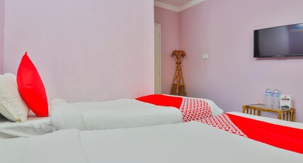 OYO 720 Lekali Homes And Restaurant Room Type - Deluxe