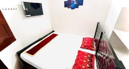 Aura Residency Room Type - Double cot Bedroom AC