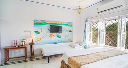 Vikramgarh Lakeview at Fatehsagar| Infinity Pool and Sitout  Room Type - Family Room with Garden View
