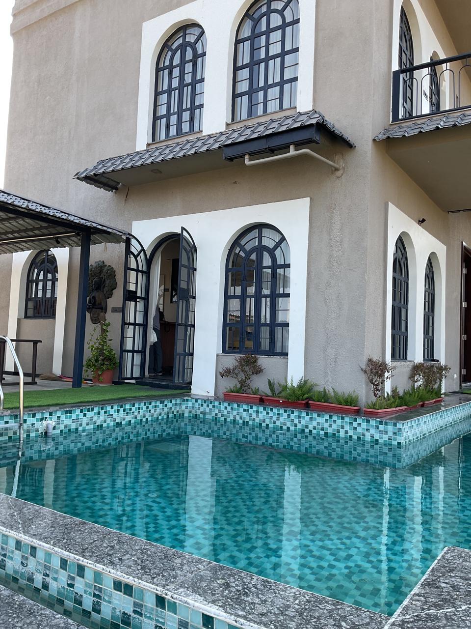 Arch Manor-Aravali View Luxury Villa by Aarvaya - Tap to explore photos