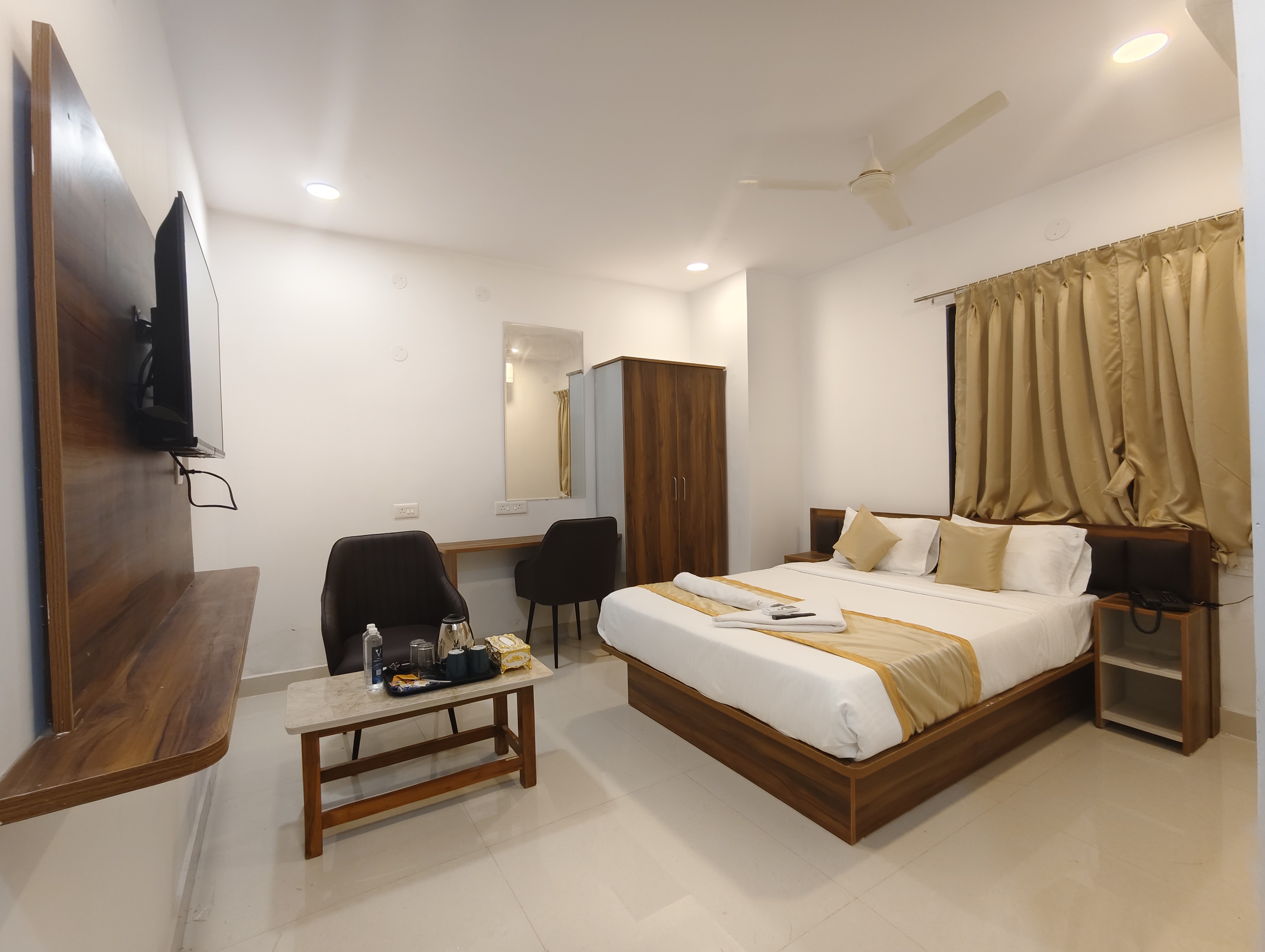 Hotel Vamshi Grand - Tap to explore photos