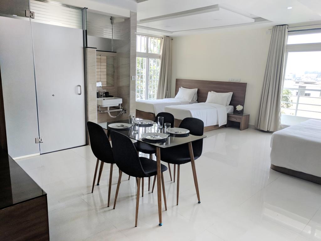 Clyford Suites | Rooms & Wi-Fi - Tap to explore photos