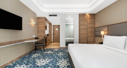 Holiday Inn Gurugram Sector 90 By IHG Room Type - 1 King Premium Kitchenette Balcony