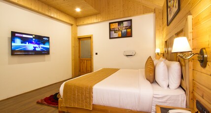 The WhiteStone Resort,Manali  (Centrally Heated Mountain view) Room Type - Premier Family suite with Open Sit Out