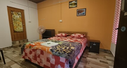 Ellickal Homestay Room Type - Budget Double room top floor