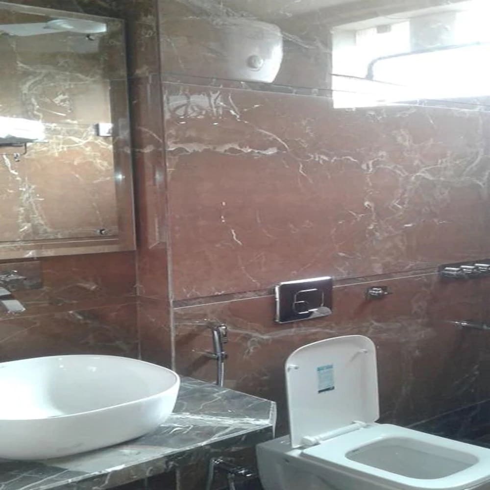 Hotel Grand Inn - Tap to explore photos