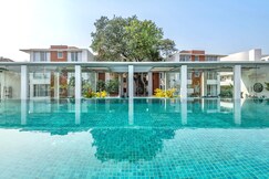 Modern Tropical 2BHK | Near Beach | Pool & Garden | Hireavilla