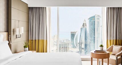 Pullman Doha West Bay Room Type - 1 BEDROOM APARTMENT, King Size Bed, Living and Dining Room, Kitchen