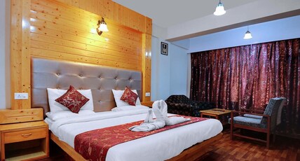 Royal Batoo (5 mins Drive to Dal Lake) Room Type - Super Deluxe Room