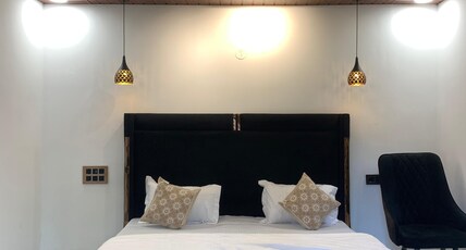 THE CHARMING NIGHTS Room Type - Superior King Suite Non AC Room