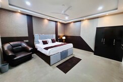 Address of AXOM HOMESTAY & VILLAS