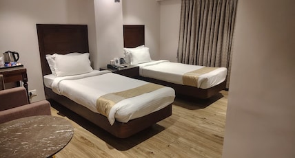 Pragati Manor Room Type - CORPORATE ROOM TWIN BED