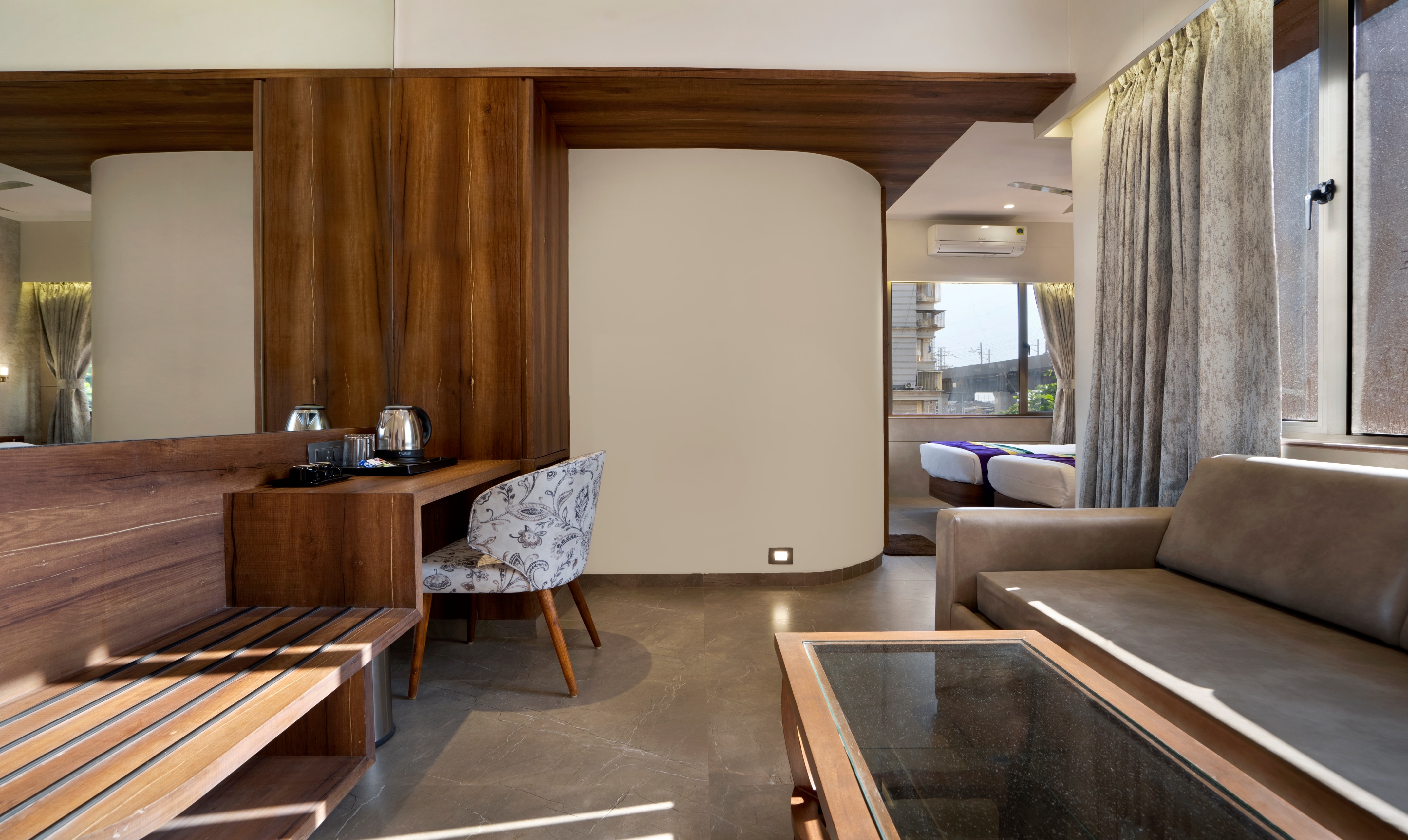 Treebo Premium Savera Inn - Tap to explore photos