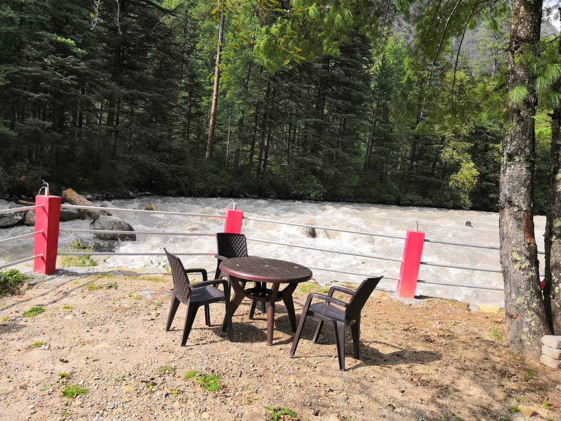 Himalayan river site camp kasol - Tap to explore photos