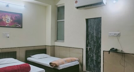 Hotel Tulsi Inn Room Type - deluxe triple bed room