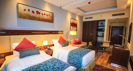 Rose Park Hotel Al Barsha Room Type - Deluxe Twin Room.