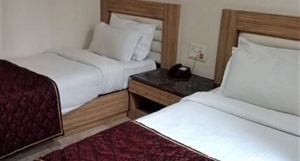 Hotel Raj Palace (3km from Bus & Railway Station) Room Type - Deluxe Room with Twin-Bed (Corporate Edition) Hotel Raj Palace (3km from Bus & Railway Station) Room Type - Deluxe Room with Twin-Bed (Corporate Edition)