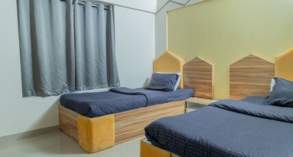 Copper 11 Service Apartments -SB Road, Shivaji Nagar, Pune Room Type - One-Bedroom Apartment with Twin Bed and Mountain View Copper 11 Service Apartments -SB Road, Shivaji Nagar, Pune Room Type - One-Bedroom Apartment with Twin Bed and Mountain View