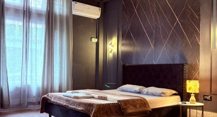Aarna Homestay Room Type - Black Room with Common Living room & kitchen