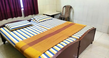Tourist Home Chinmayi Room Type - Budget Double NON AC