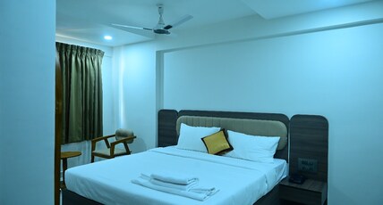 Sitara Grand Boarding and Lodging Room Type - Deluxe Room