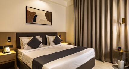 Hotel Starlight by Avana Room Type - Deluxe King Bed Room with AC