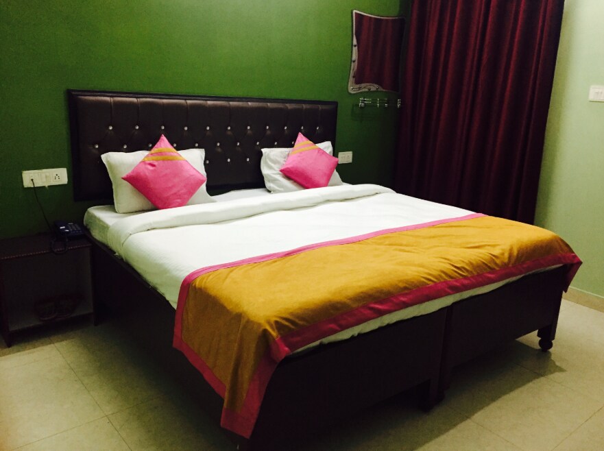 Hotel Dev Bhoomi - Tap to explore photos