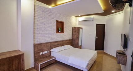 Atholi residency Room Type - Deluxe double room with balcony 