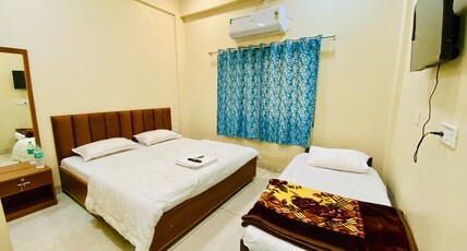 Hotel Rewanchal Room Type - Triple Bed AC Room