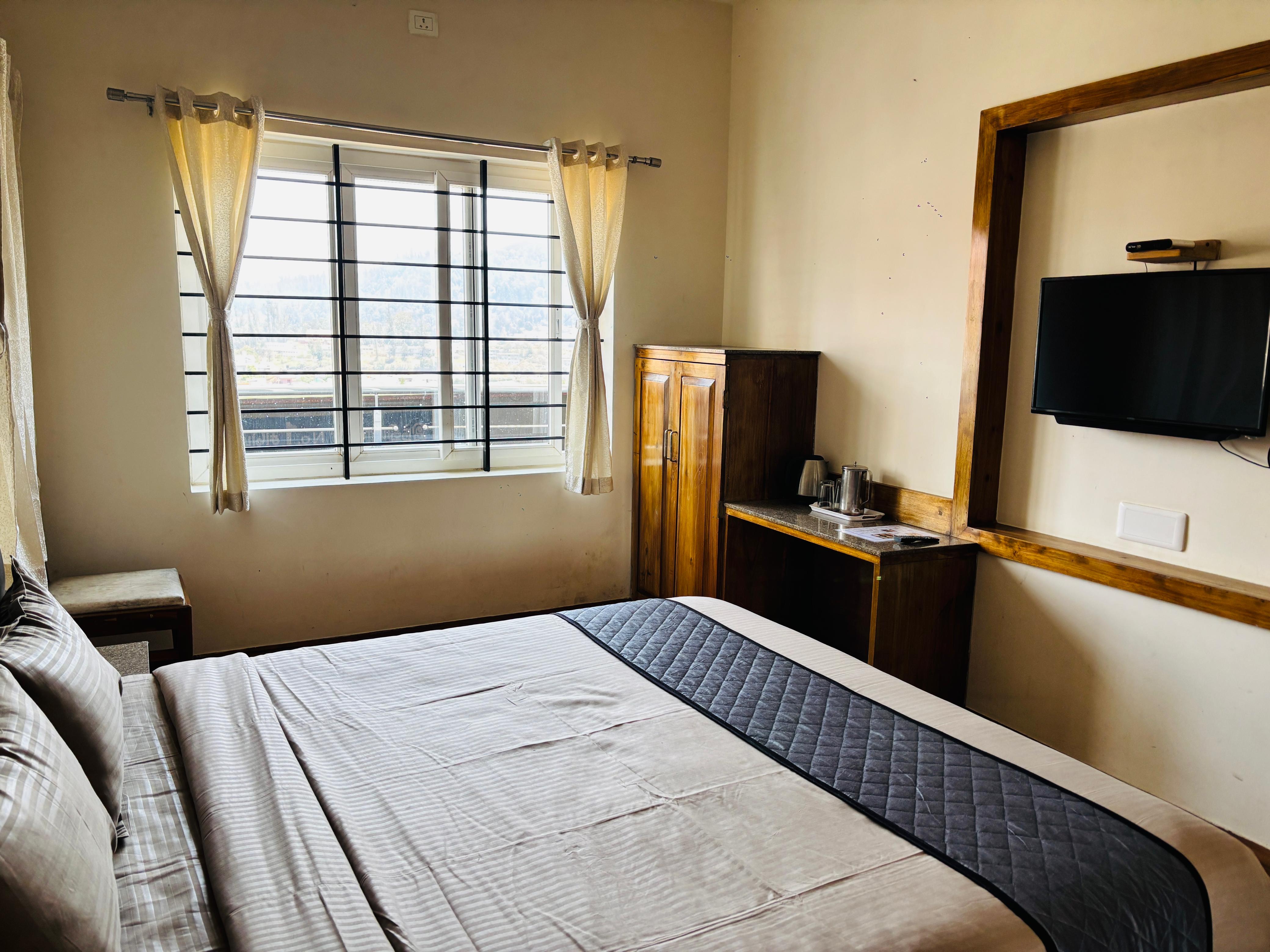 SRJ Thaneesh Service Apartments - Tap to explore photos