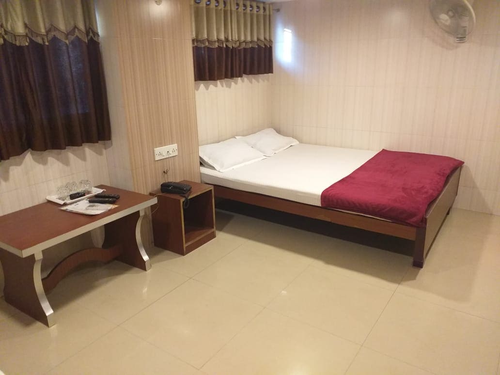 Hotel Akash - Tap to explore photos