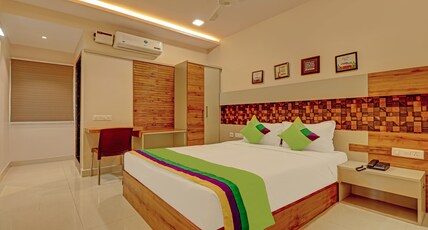 Treebo Rainbow Grand Room Type - Deluxe Room