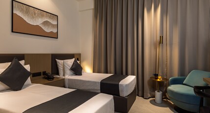 Hotel Starlight by Avana Room Type - Deluxe Twin Room with 2 single beds