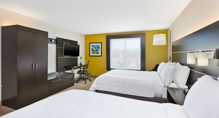 Holiday Inn Express & Suites CLEVELAND-RICHFIELD Room Type - 2 Queen Standard Communications Mobility Accessible Tub Holiday Inn Express & Suites CLEVELAND-RICHFIELD Room Type - 2 Queen Standard Communications Mobility Accessible Tub