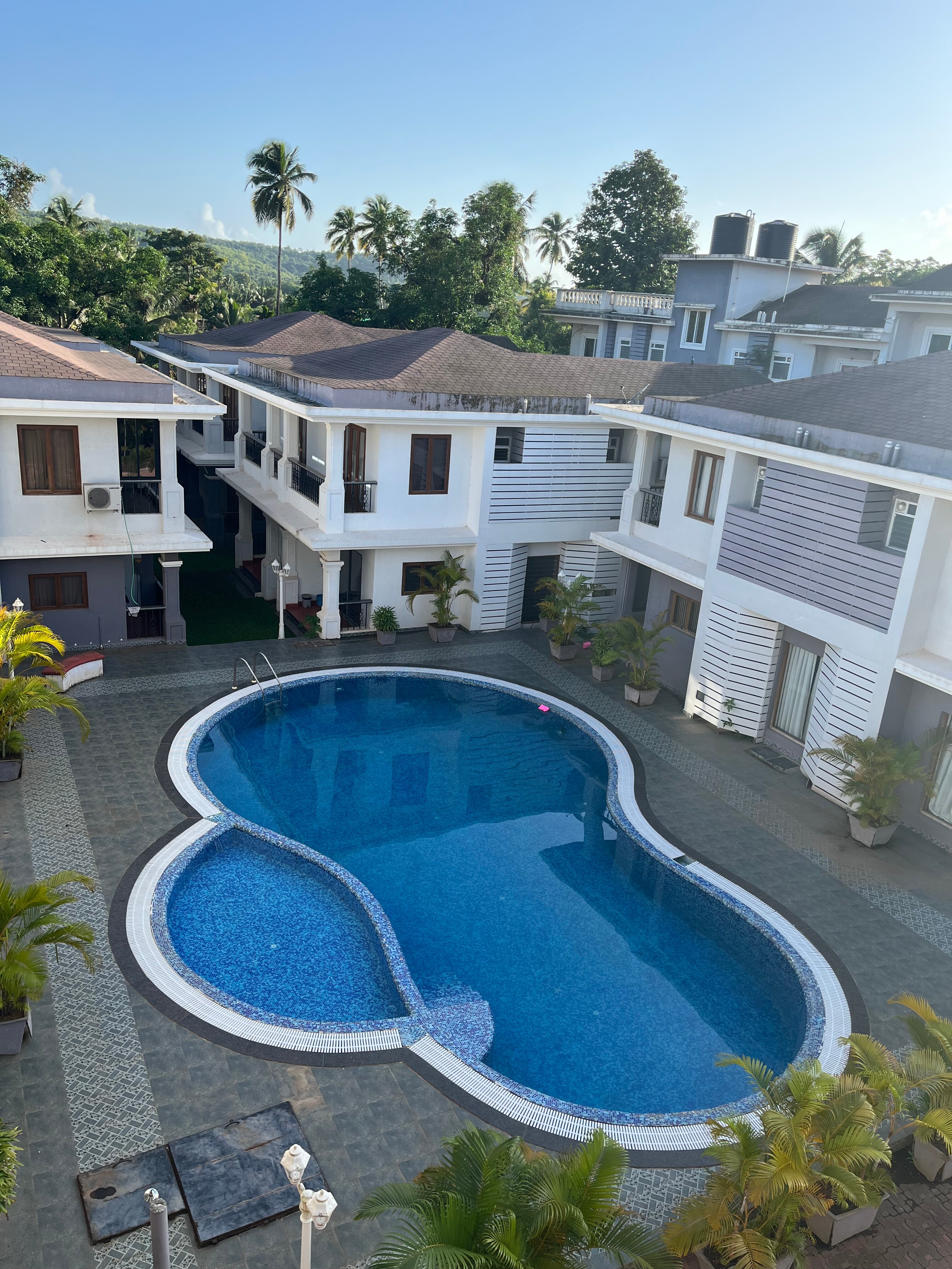 Grihaa Elegant 1BHK Apartment with Pool Access in Assagao, Anjuna - Tap to explore photos