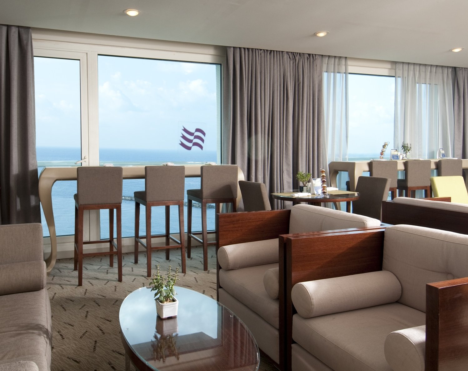 Crowne Plaza Tel Aviv Beach - Tap to explore photos