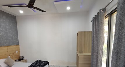 Qcent Bairagarh Resort Rishikesh Room Type - Deluxe Room with Mountain View King Bed