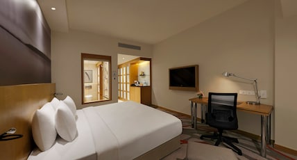Novotel Hyderabad Convention Centre Room Type - Executive Premier Room with Queen Bed (Poolside), One-Way Airport Transfer & Premier Lounge Access Novotel Hyderabad Convention Centre Room Type - Executive Premier Room with Queen Bed (Poolside), One-Way Airport Transfer & Premier Lounge Access