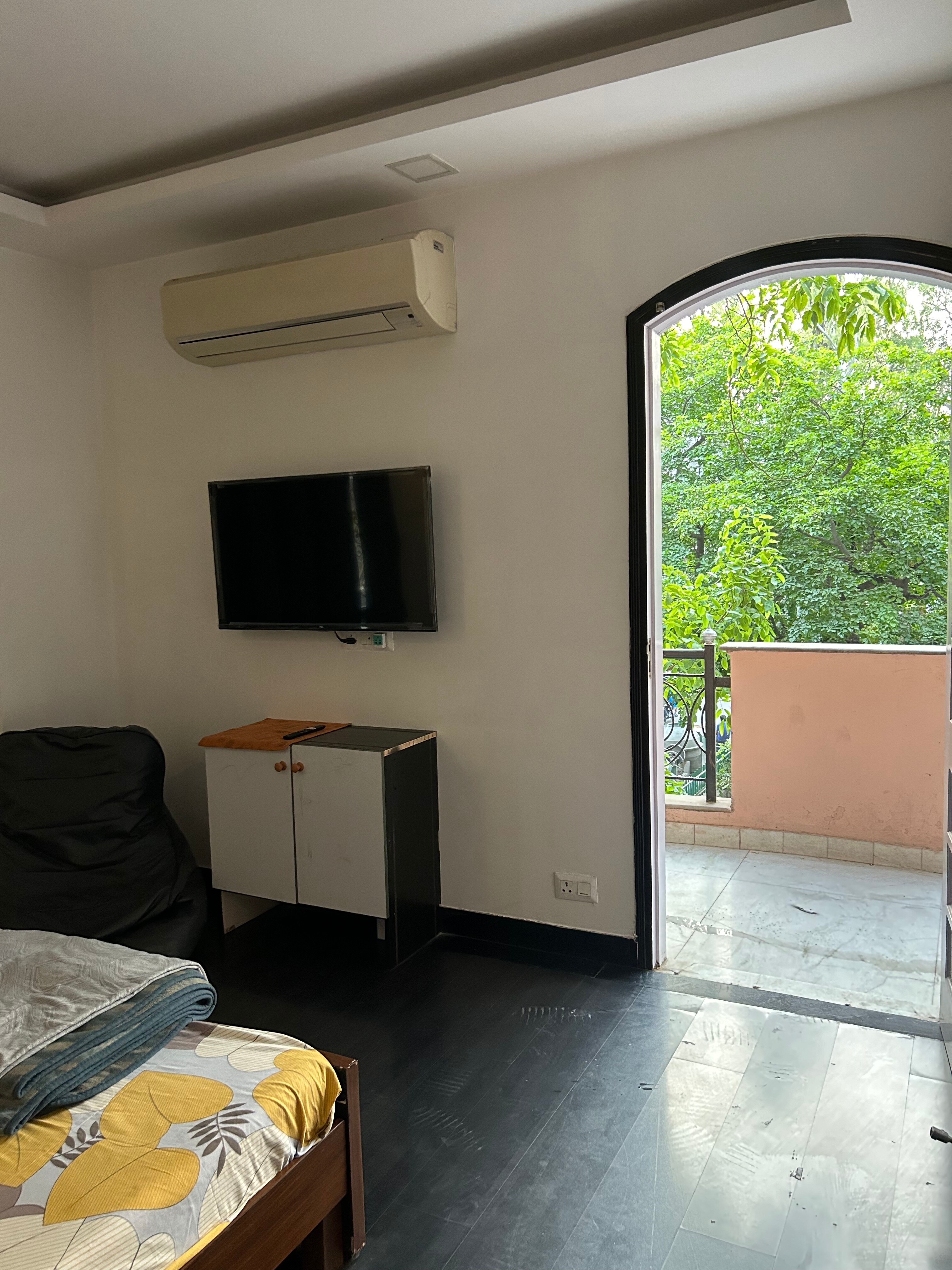 Room with Private Balcony By Bliss-full Stays - Tap to explore photos
