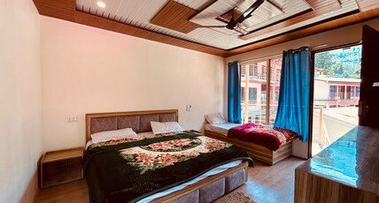 Kedar Valley Resorts Room Type - Deluxe Triple Room with Mountain View