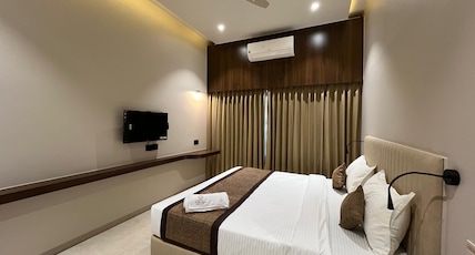 Hotel Purnima Regency Dhule Room Type - Deluxe Room AC Hotel Purnima Regency Dhule Room Type - Deluxe Room AC