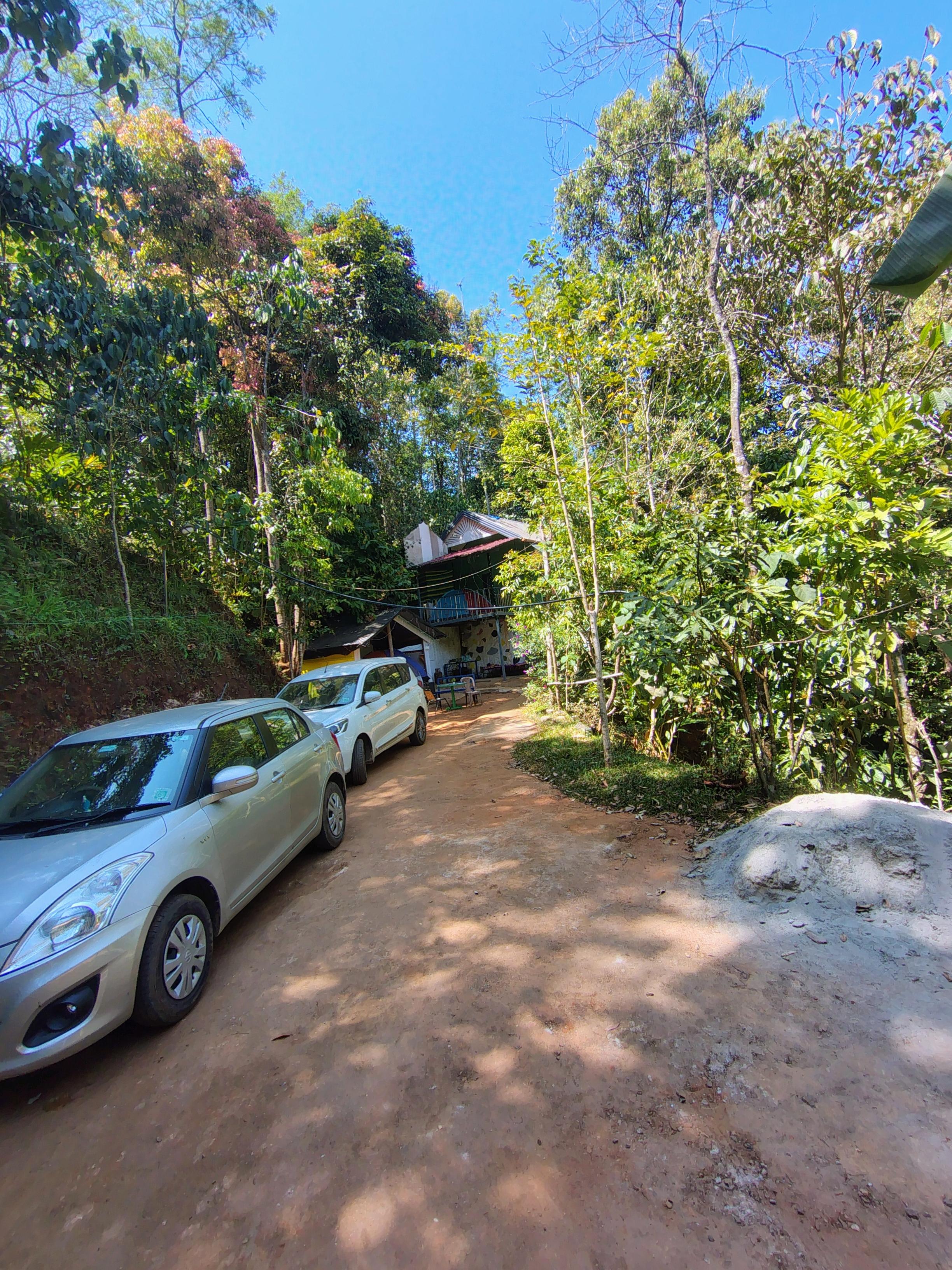 Green portico tent and hut stay - Tap to explore photos