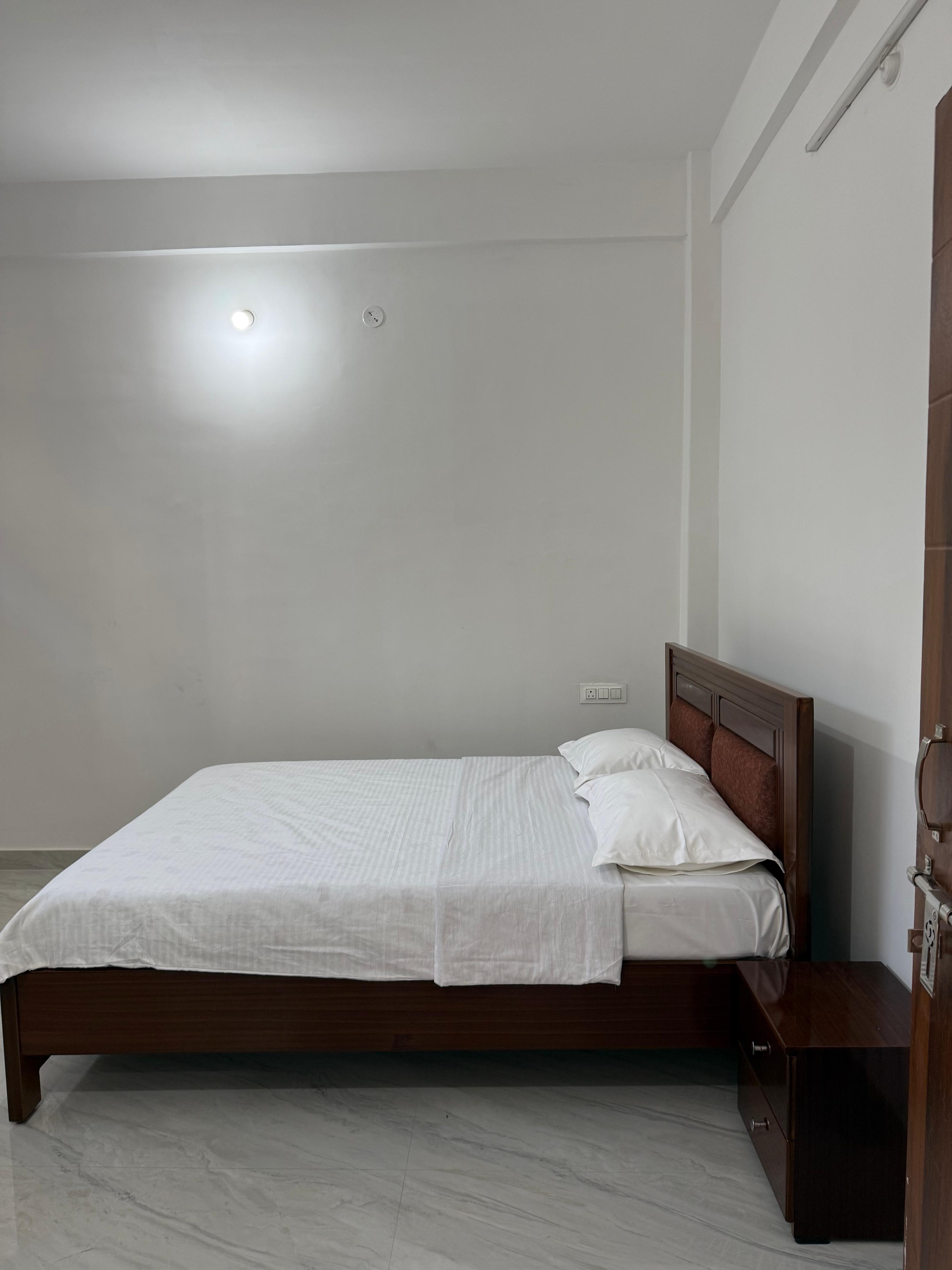 Modern 2BHK Near Bhutan Gate | Tinhenric's - Tap to explore photos